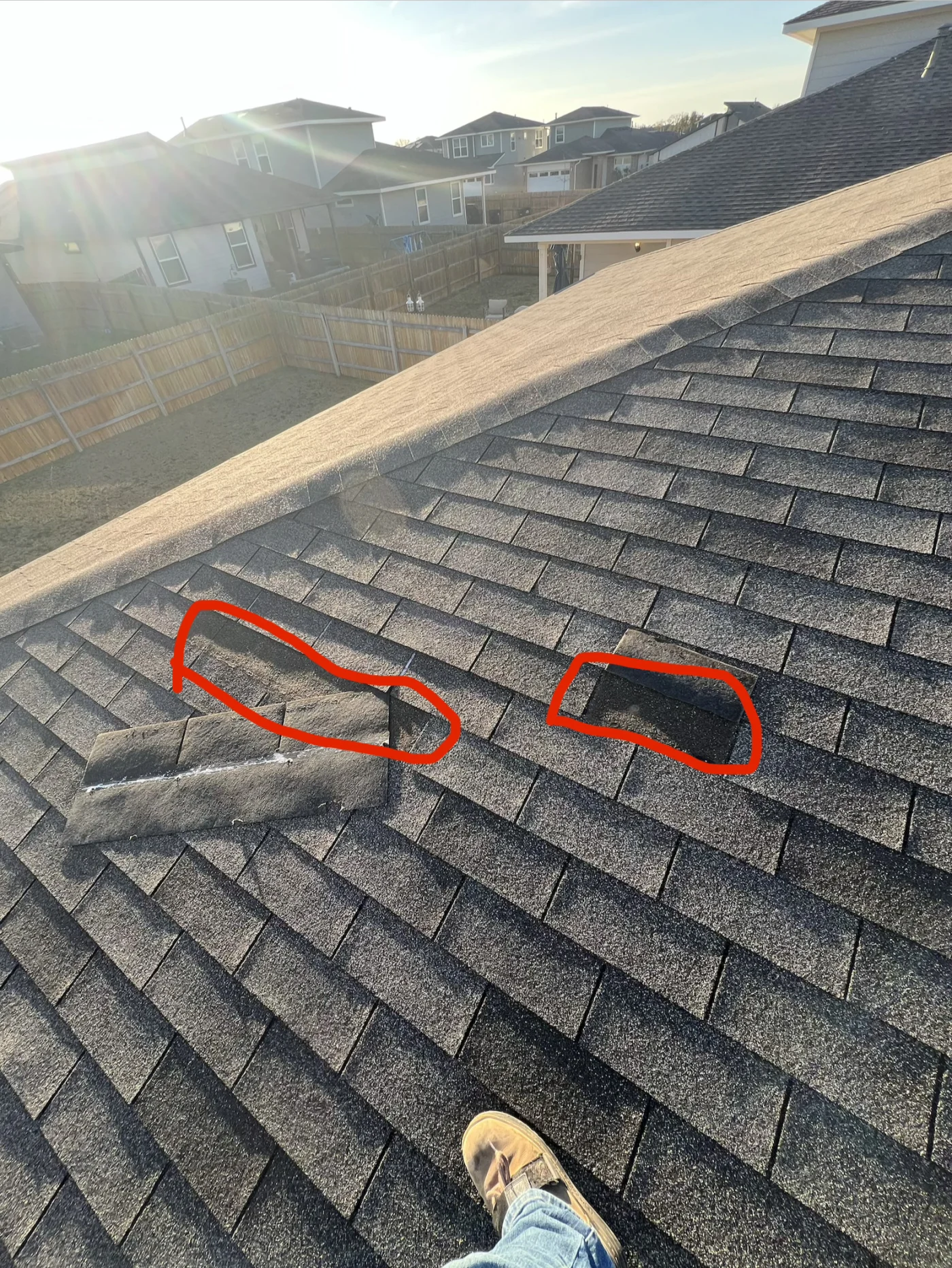 Residential Roof Repair | Wolfpack Roofing & Exteriors | Austin Circled roofing damage in need of repair by wolfpack in austin