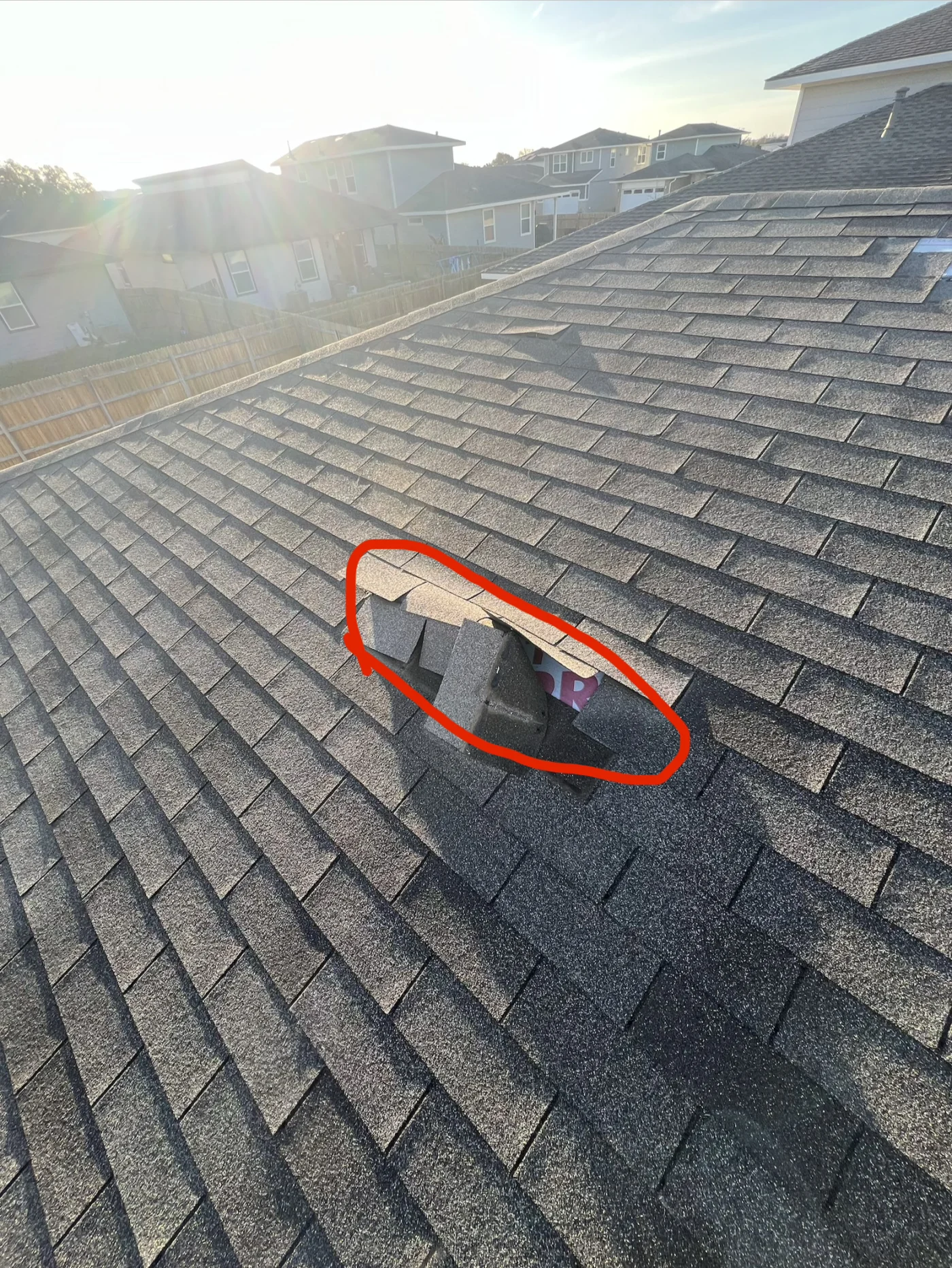 Storm Damage & Insurance | Roof Repair | Wolfpack Roofing & Exteriors | Austin Storm damage circled in red on roof in austin, texas