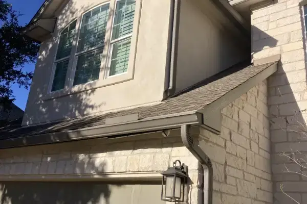 Wolfpack Roofing & Exteriors | Stucco Repairs | Austin, TX Exterior home in austin, texas with repaired stucco by wolfpack roofing & exteriors